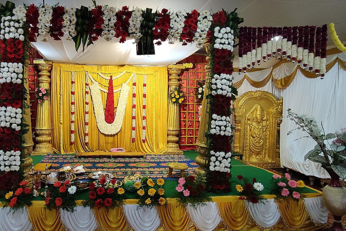 A decorated wedding stage with flowers